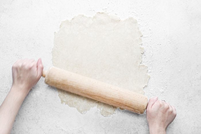 Roll out the chilled dough on the light floured surface