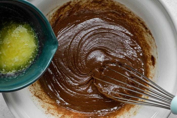 Whisk melted butter into the mix until smooth