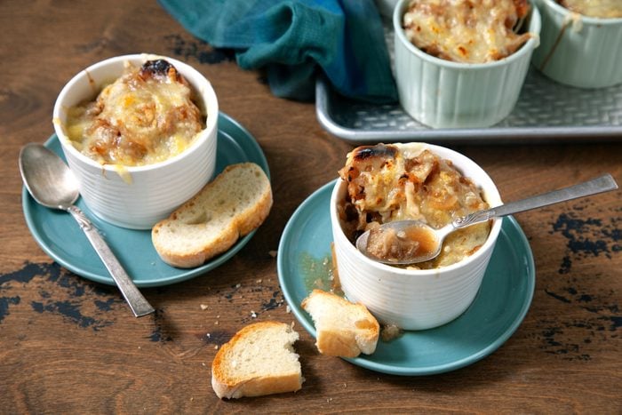 Classic French Onion Soup served in small plated with toast