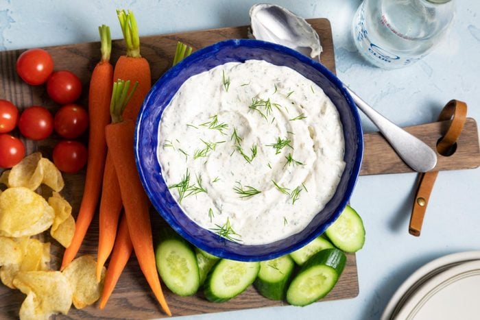 Dill Dip in a bowl with other vegetables