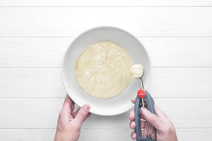Scooped dough in a teaspoon
