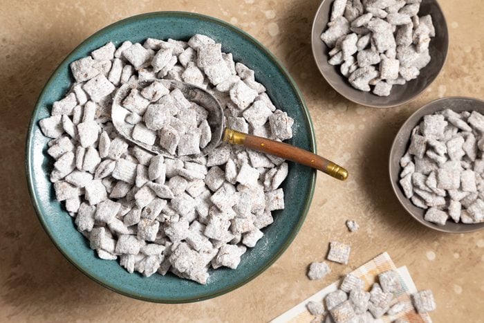 A close-up photo of a bowl filled with Puppy Chow