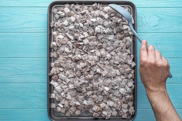 Set the puppy chow in a large baking tray