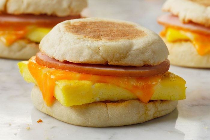Freezer Breakfast Sandwiches on a marble counter in a kitchen