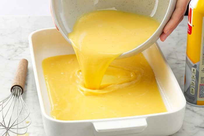 Pouring the egg mixture in a baking tray