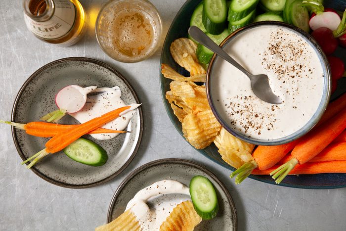 Garlic Dip served with vegetables in a large plate