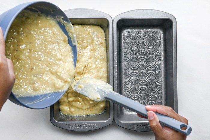 Pouring Gluten-Free Banana Bread Batter into Loaf Pans