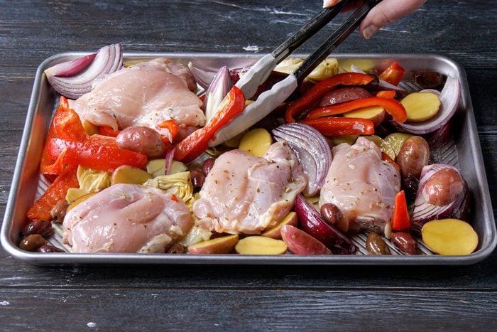 Place the chicken and vegetables on a baking pan