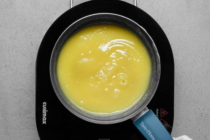 Beaten egg yolks mixture cooked in a sauce pan