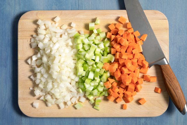 Finely chopped veggies on cutting board