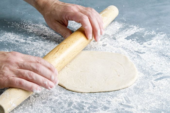 Rolling out the dough with rolling pin