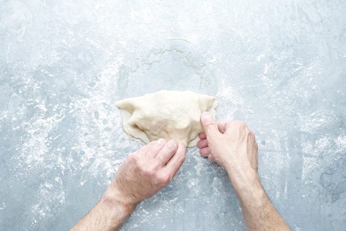 Folding the dough with hands