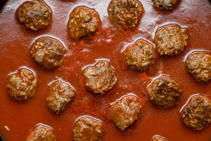 Cook the meatballs in a large skillet with canola oil
