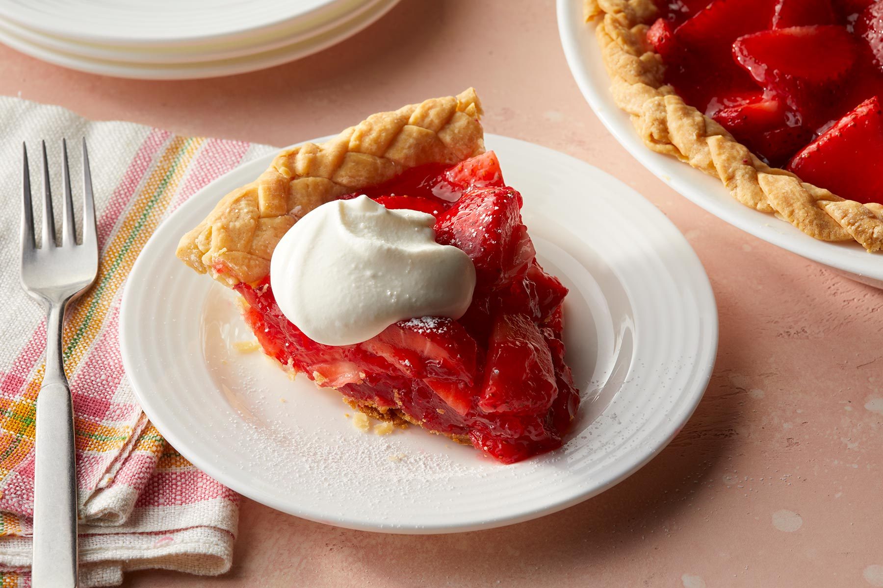 Strawberry Pie served with ice cream on a plate
