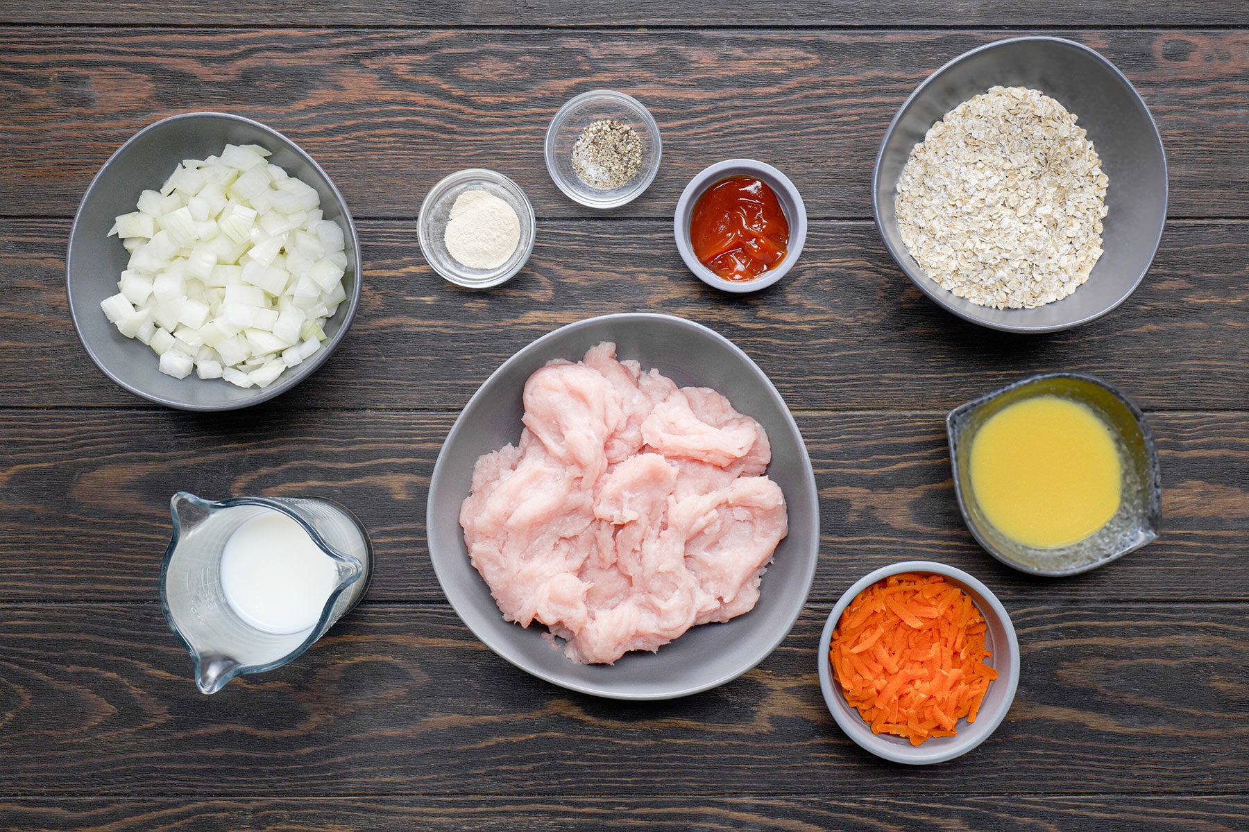 Ingredients for Turkey Meat Loaf on wooden surface