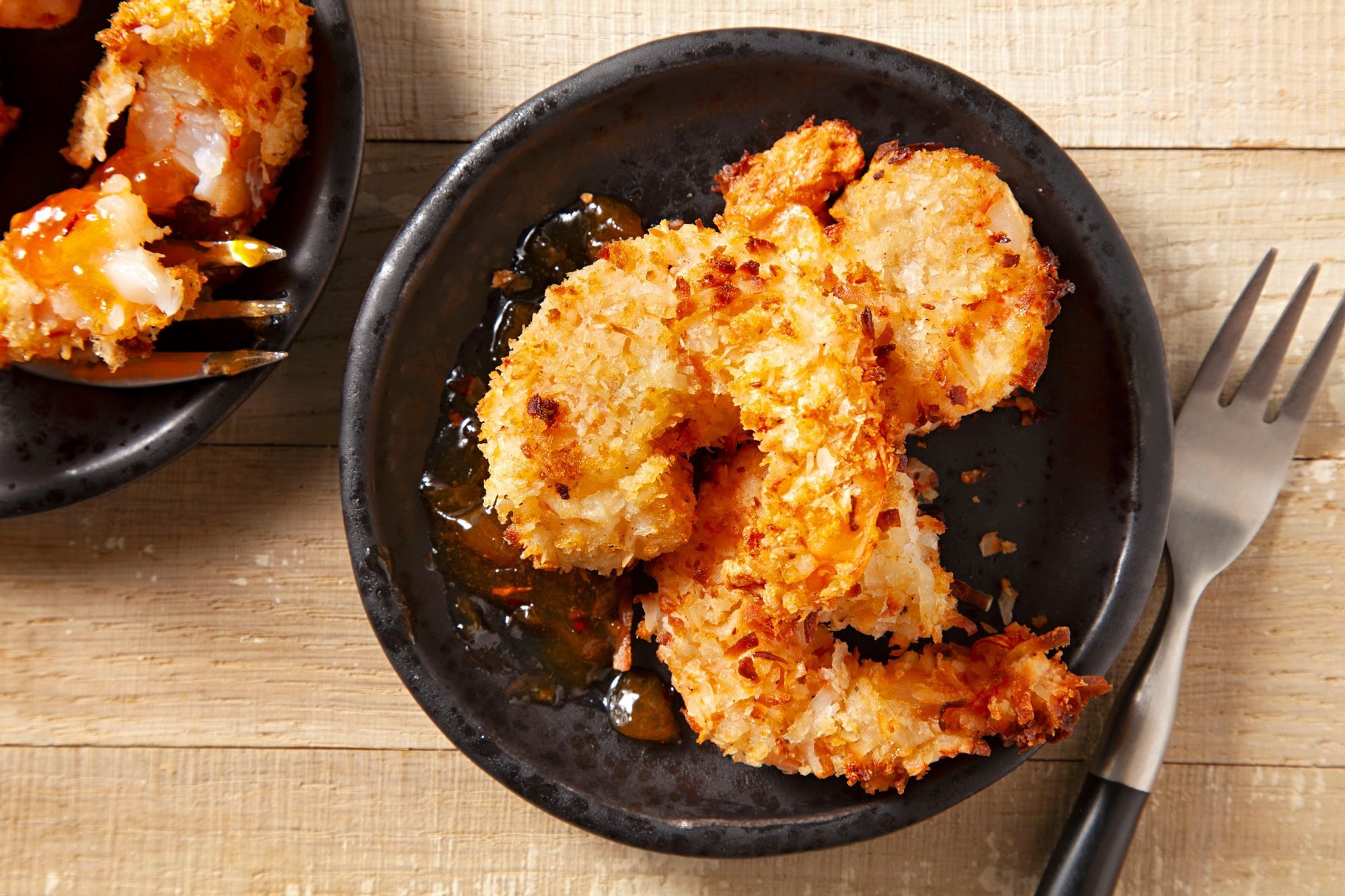 Delicious Air-Fryer Coconut Shrimp on plate with fork