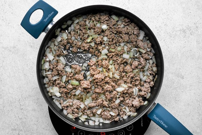 Chopped Onions and Beef in a large skillet