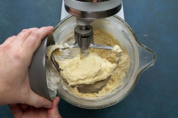 Dissolve the yeast with warm water in a stand mixer