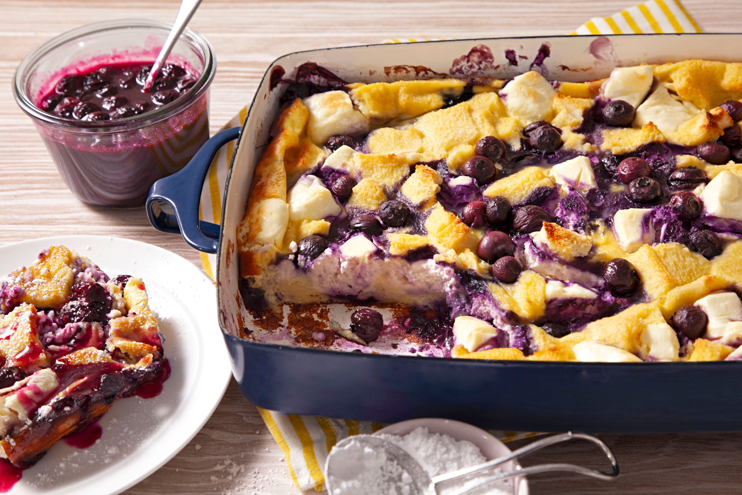 Blueberry French Toast in a baking dish with a slice removed