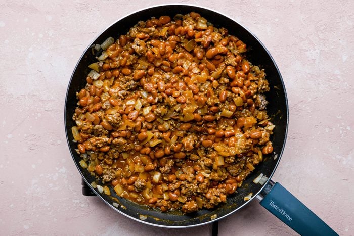 Stir the ranch-style beans into the pan with beef and heat throughly