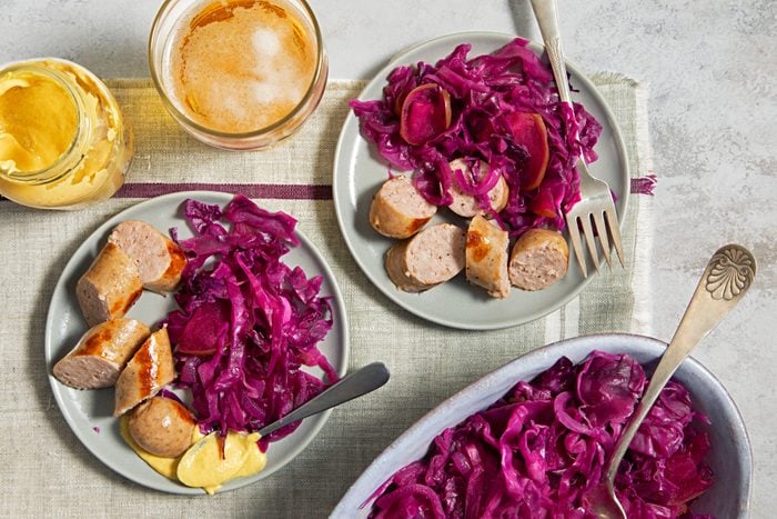 Two Plates of German Red Cabbage with Sausages.