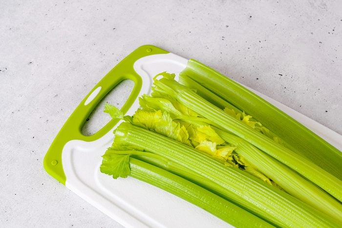 celery stalks on cutting board