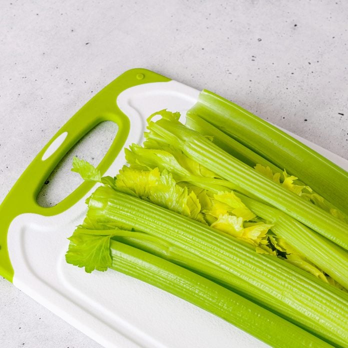 celery stalks on cutting board
