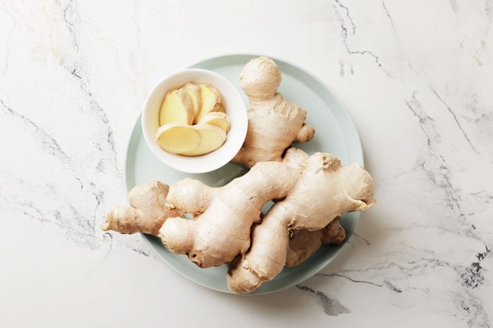 fresh and sliced ginger on a a plate