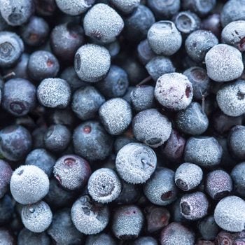 Frozen blueberries background