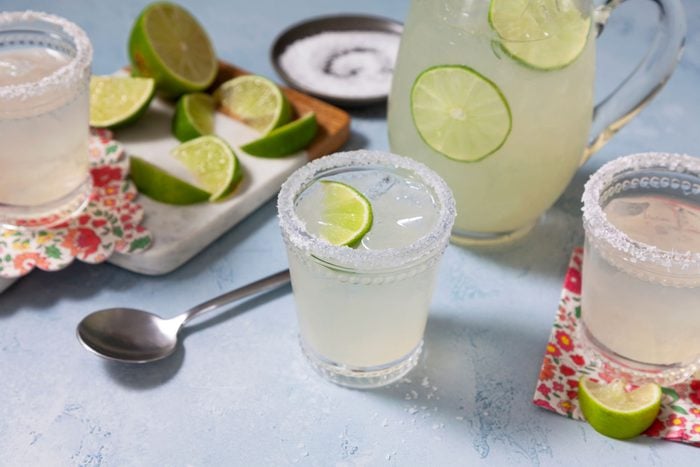 Pitcher Margaritas served in a glass on a kitchen countertop