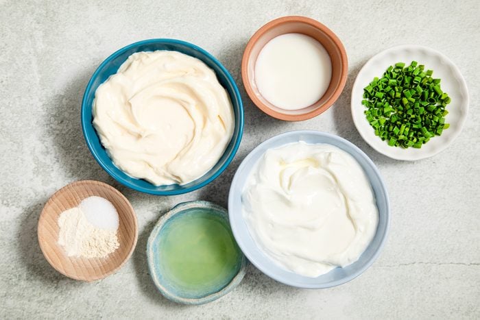 A group of bowls of with Ranch Dip Ingredients