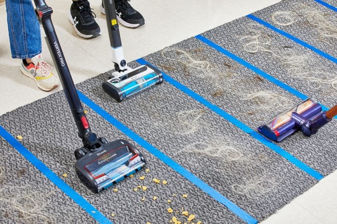Cleaning a carpet with different Shark vacuums 