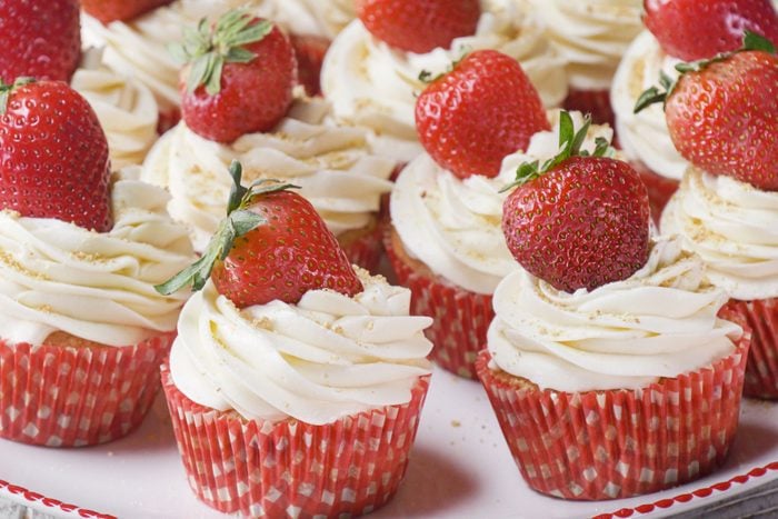 Strawberry Cheesecake Cupcakes served on a large plate