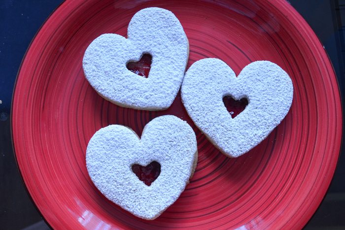 Linzer heart cookies served in a plate