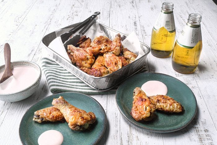 Baked Chicken Wings served with dipping and beverages