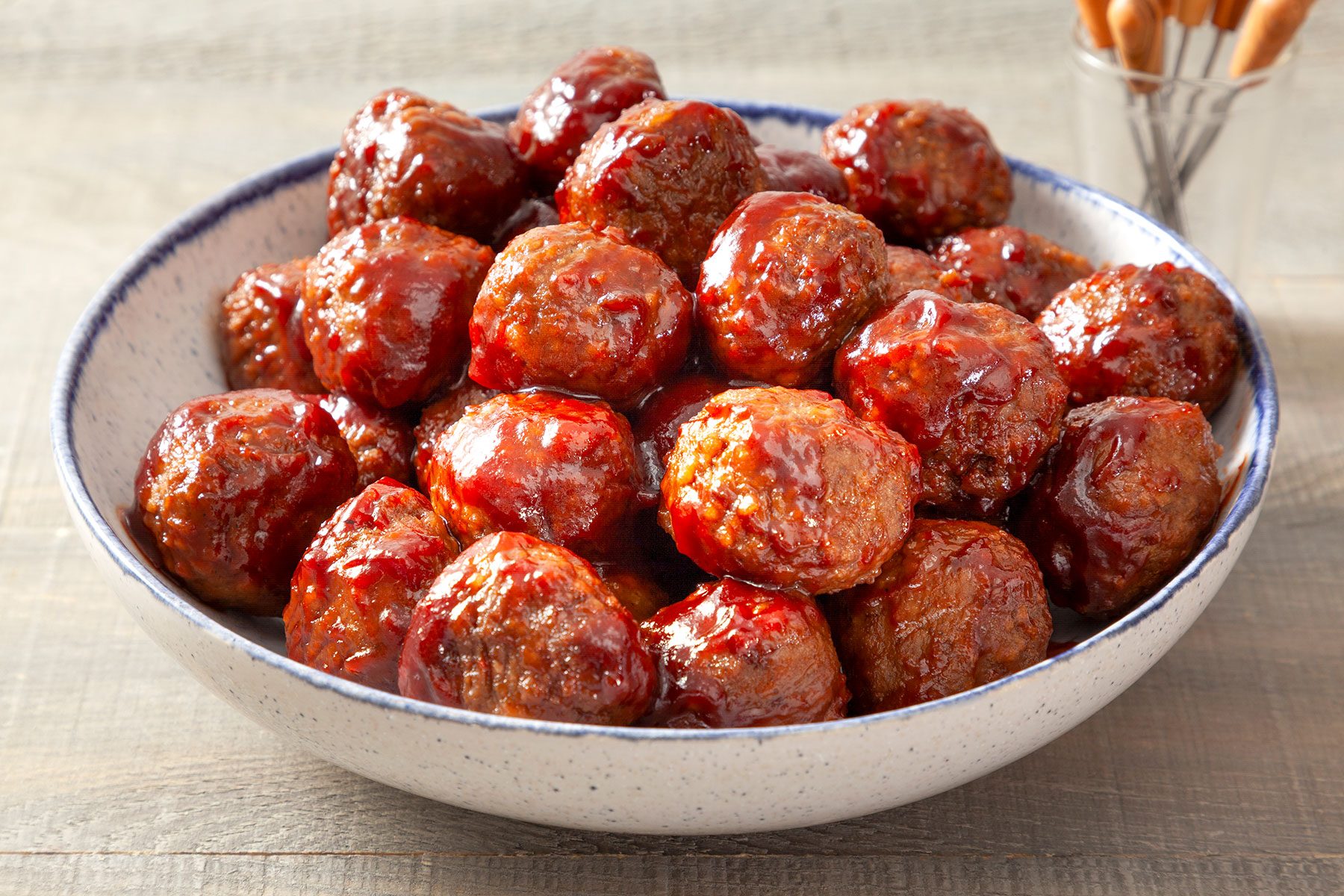 Chili And Jelly Meatballs served in large white bowl