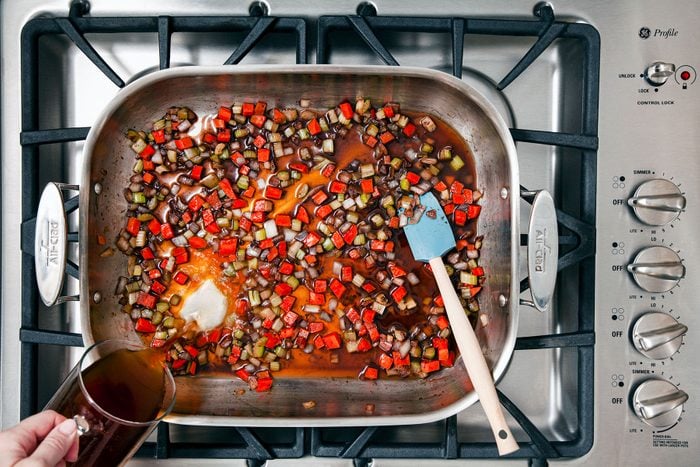 A pan of food on a stove