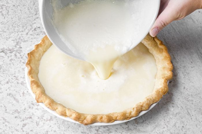 Pouring custard over crust