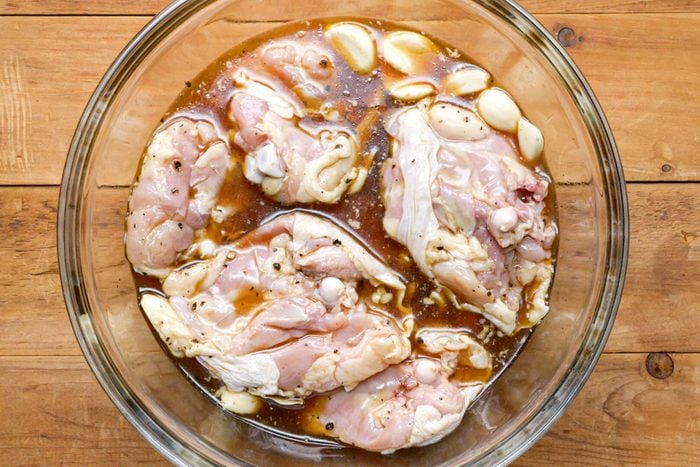 Chicken Marinating in large glass bowl