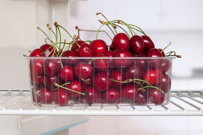 Cherries in empty fridge 
