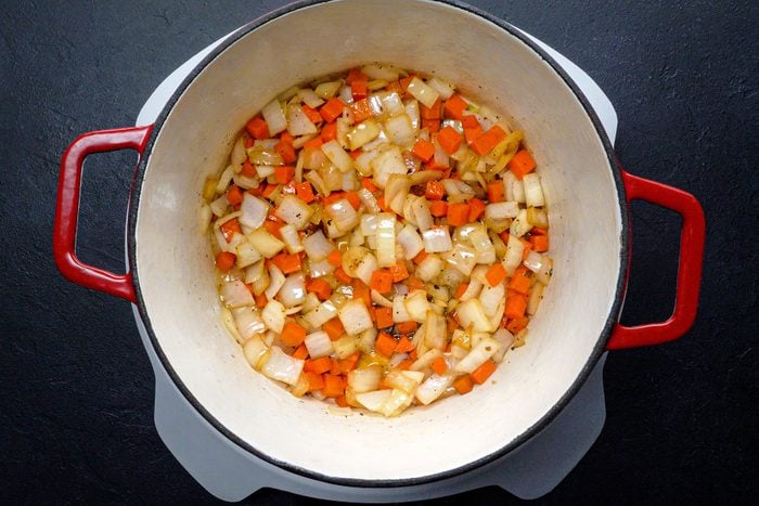 Cooking diced onions, carrots and other ingredients