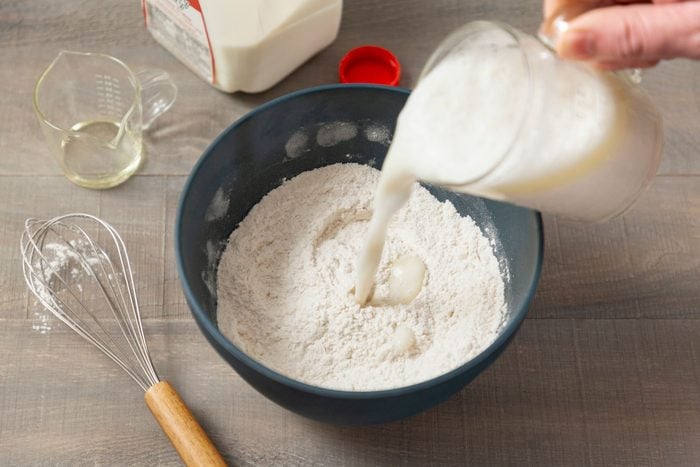 Pouring Yeast Mixture into Flour