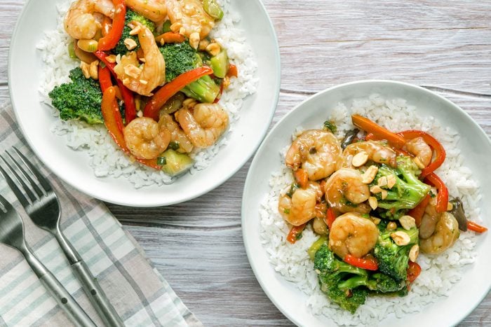 Delicious Shrimp Stir Fry served with rice in bowls