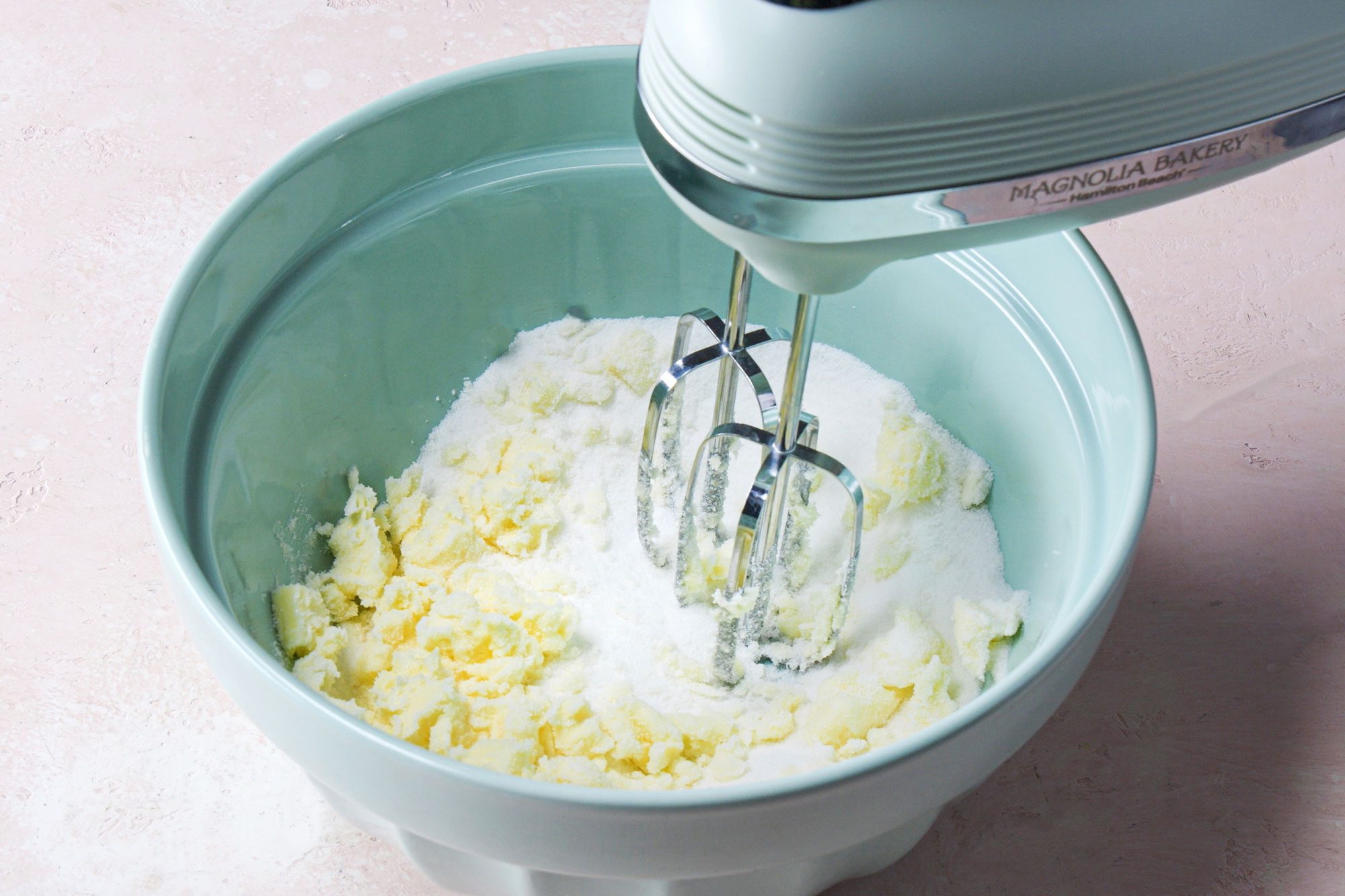 Whisk together the flour, baking powder and salt with the help of Stand Mixer